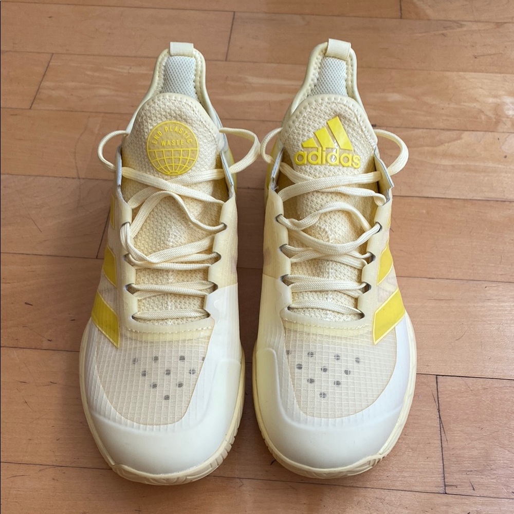 Adidas, 8.5 W Adizero Ubersonic 4 yellow. Never worn.